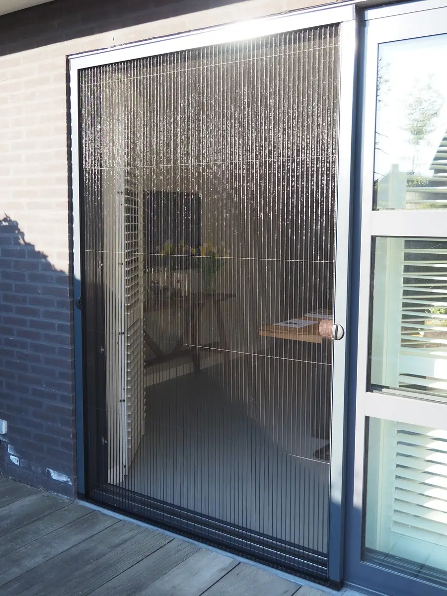 Plissé hordeur voor een schuifpui naar het terras